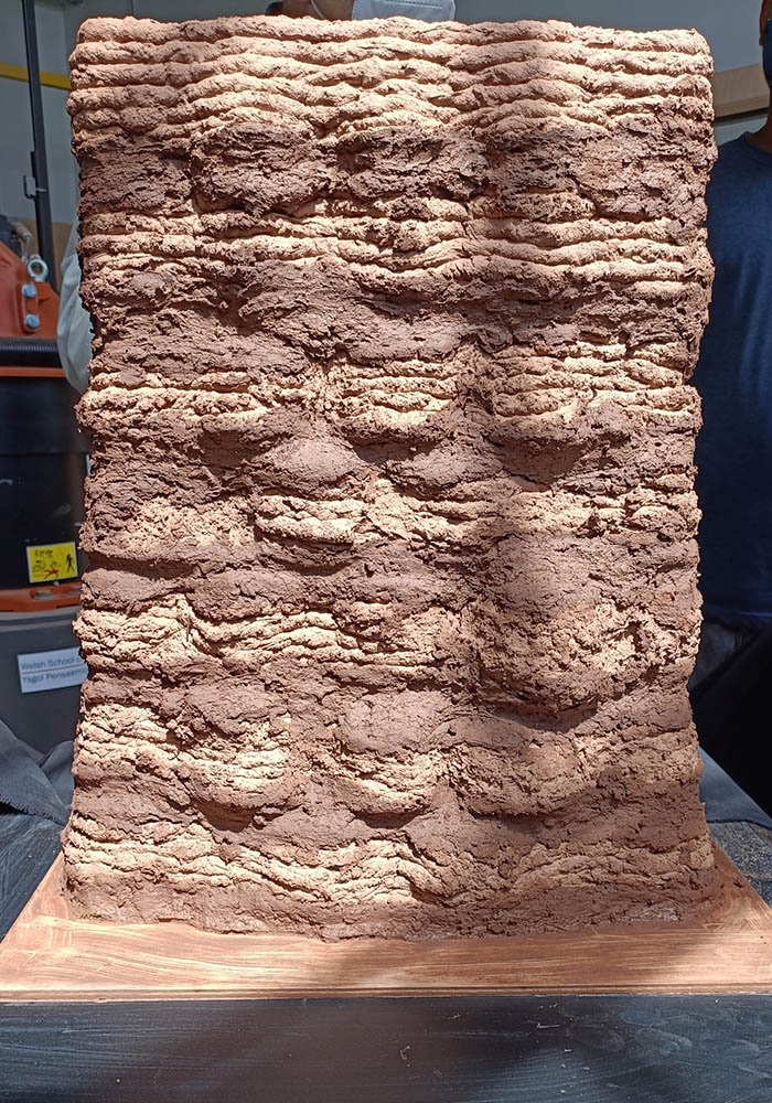 3. The same soil mix used for 3D printing blocks was also used as a mortar to assemble the blocks into a wall.